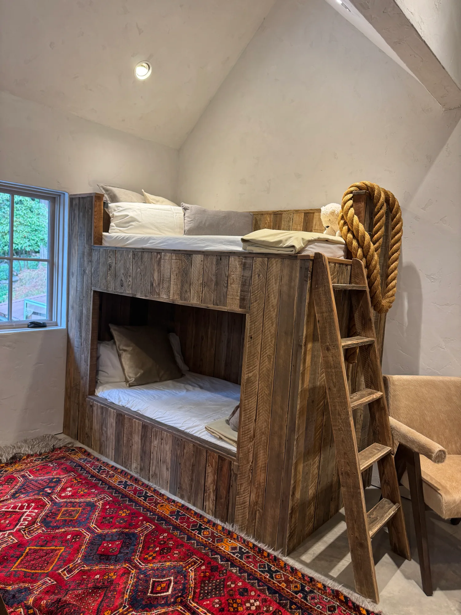 Bunk room with rope ladder